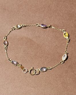 Pulsera de oro con circonitas de colores